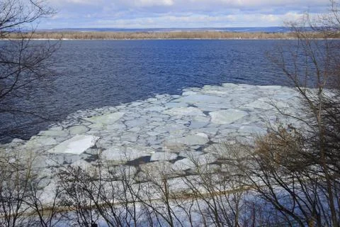 Spring ice drifting on the river. Background texture. Stock Photos