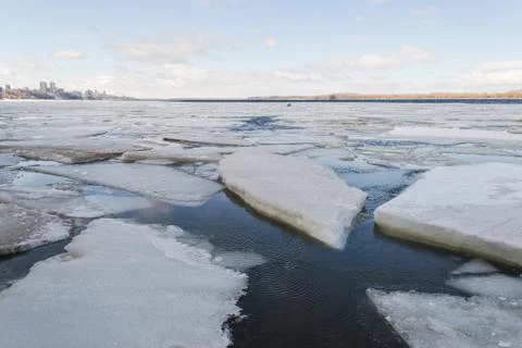 Spring ice drifting on the river. Background texture. Stock Photos