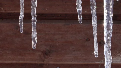 Spring icicles on the roof Stock Footage 235008145
