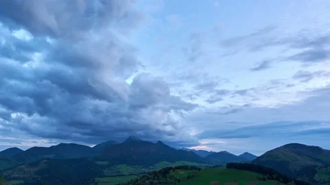 Spring landscape with cumulative clouds, A huge storm cloud forms over the Stock Footage 167974713