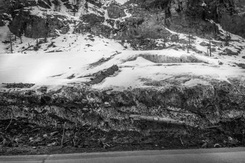 Spring landscape in the mountains in black and white with snow. Bad weather Stock Photos