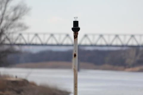 Spring landscape with old lamp on the backround with bridge over a river Foto stock