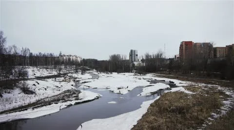 Spring landscape with snowy river Video stock 20603566