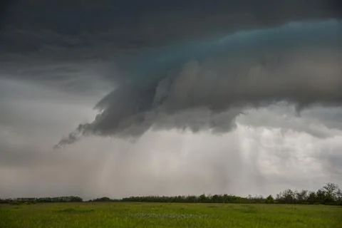 Spring landscape with a stormy sky Stock Photos