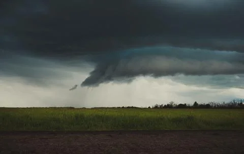 Spring landscape with a stormy sky Stock Photos