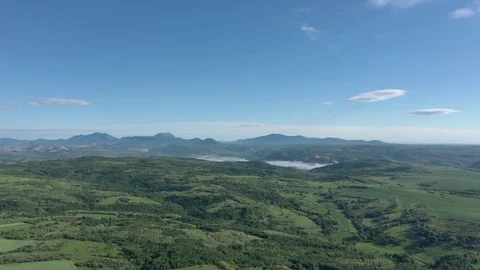 Spring landscape under blue sky in Eastern Serbia 4K aerial video Stock Footage 113887899