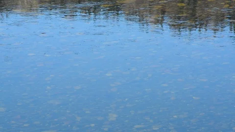 Spring landscape view of the river and mountains against the sky and houses Stock Footage 107088836