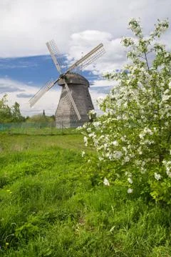 Spring landscape with windmill Stock Photos