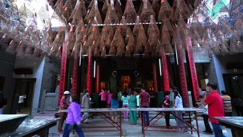 Spring lively atmosphere at temple to pray with pilgrims for peace Stock Footage 156077247