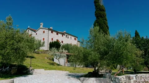 Spring Location Blooming Trees at Miholjska Prevla Monastery wide plan Vidéo 335070348