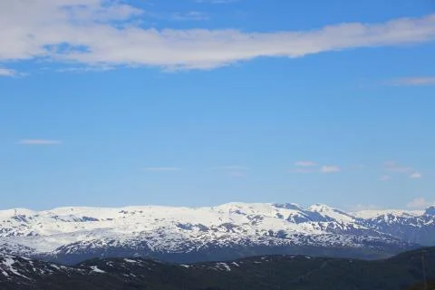Spring mountains and sky Stock Photos