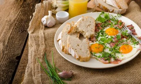Spring omelette with bacon, egg and herbs Stock Photos