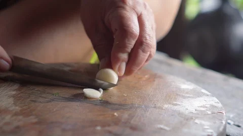 Spring onion get slicing by knife in lady hands. Preparing for cooking.  Stock Footage 114653957