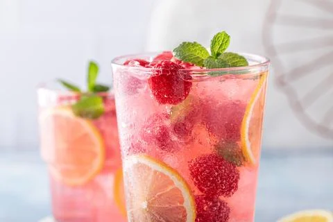 Spring or summer cold cocktail, raspberry lemonade Stock Photos
