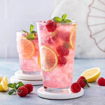 Spring or summer cold cocktail, raspberry lemonade Stock Photos