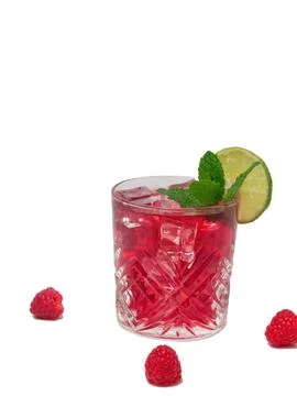 Spring or summer cold mocktail, raspberry lemonade and lime on white backgrou Stock Photos