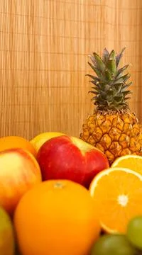 Spring or Summer concept. Many kinds of fruit. Vertical photo Stock Photos