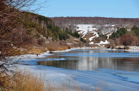 Spring panorama of melting ice on the Sylva river within the city of Kungura. Stock Photos