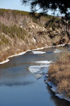Spring panorama of melting ice on the Sylva river within the city of Kungura. Stock Photos