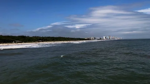 Spring pier view of the surf and beach Myrtle Beach South Carolina Stock Footage 89735310