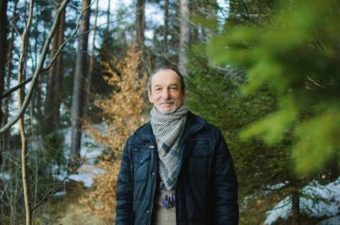 The spring portrait of elderly man with a gray beard Stock Photos