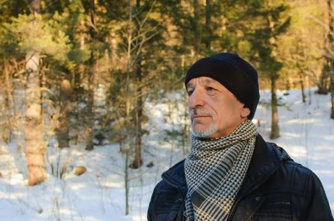 The spring portrait of elderly man with a gray beard Stock Photos