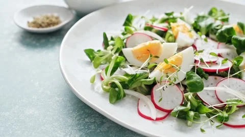 Spring radish and eggs salad Stock Footage 274072260