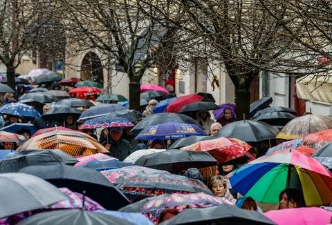 Spring rain in a crowded city Stock Photos