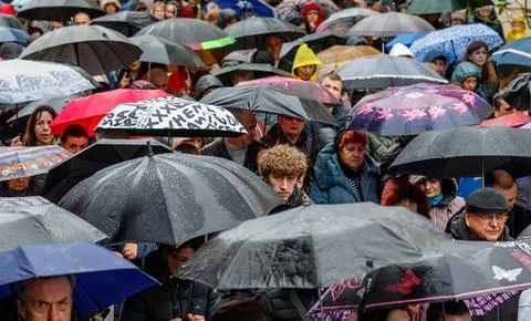 Spring rain in a crowded city Stock Photos