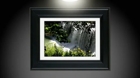 Spring rain runoff over falls  Pic Framed Stock Footage 2920391