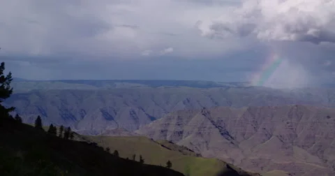 Spring rainbow over Hell’s Canyon, Snake River, Oregon Stock Footage 59560059