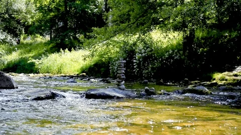 Spring river in the city flowing between rocks, Freiburg Germany, slow motion Stock Footage 121618725
