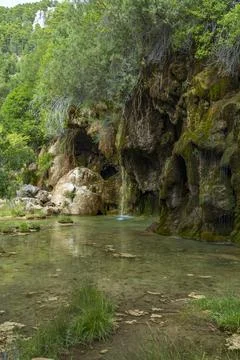 The spring of river Cuervo (Nacimiento del Rio Cuervo) in Cuenca, Castilla .. Stock Photos