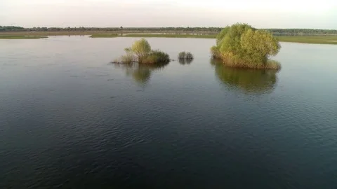 Spring river flood and yellow sky aerial view Stock Footage 73027301