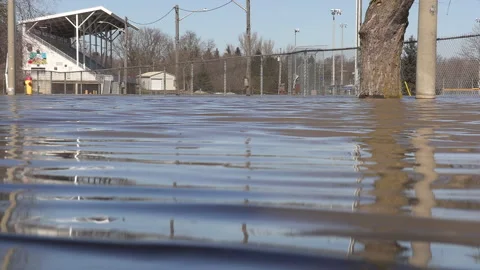 Spring river flooding during record warm temperatures in Ontario Canada 库存影片 150297140