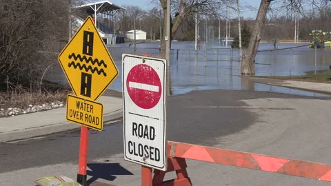 Spring river flooding during record warm temperatures in Ontario Canada Stock Footage 150305115