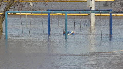 Spring river flooding during record warm temperatures in Ontario Canada Stock Footage 150306347