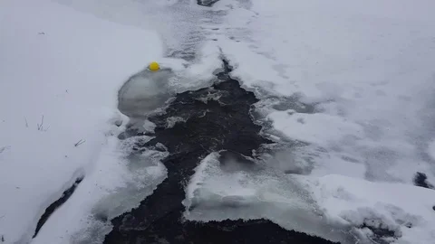 Spring river with melting ice and water Stock Footage 72671308