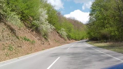 Spring road ride video on mountain pass of Pezinska Baba, Little Carpathians 库存影片 334512600
