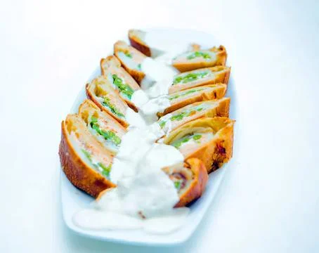Spring roll appetizer with vegetables and dipping sauce Stock Photos