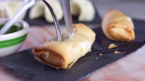 A spring roll that is cut Stock Footage 245084089