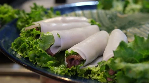 Spring roll platter Stock image of a platter, contains spring roll, samosa and Stock Footage 310386530
