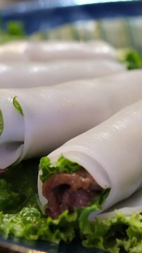 Spring roll platter Stock image of a platter, contains spring roll, samosa and Stock Footage 310487984