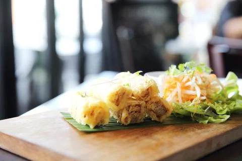 Spring roll on wood background Stock Photos