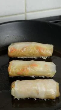 Spring rolls cooking in a pan Foto stock