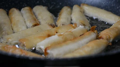 Spring rolls in deep oil 스톡 동영상 144493770