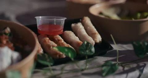 Spring Rolls With Dipping Sauce At Outdoor Market Stock Footage 336002055