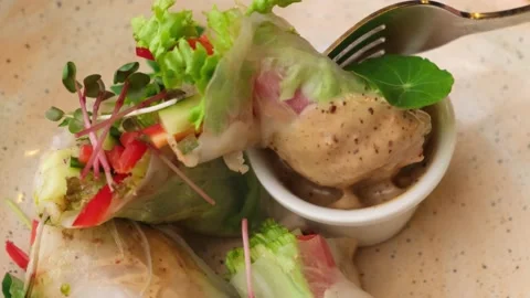 Spring rolls with shrimps, crispy vegetables and peanut sauce. An incredibly Video stock 150053873