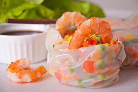 Spring rolls with vegetables and shrimps in rice paper Photos