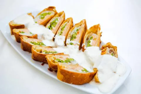 Spring rolls with vegetables on a white plate Stock Photos